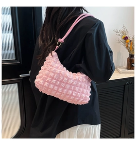 Detailed view of pink bubble texture tote bag showing soft ruffled fabric pleats