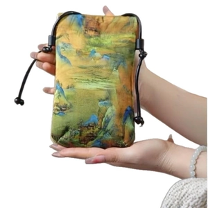 Traditional Chinese landscape silk drawstring crossbody bag with yellow mountain scenery