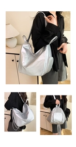 Detail of silver metallic convertible backpack showing side zipper and shiny finish