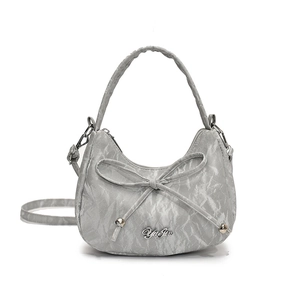 Grey bow-knot crescent crossbody bag with pleated texture and stylish top handle design