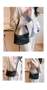 Detailed views of black lychee-grain Lindy style handbag with gold hardware and straps
