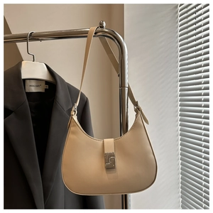 Detail of hobo bag with matte leather finish and silver geometric metal buckle