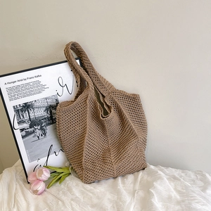 Brown crochet knit tote bag with hollow design for casual shoulder wear and large capacity