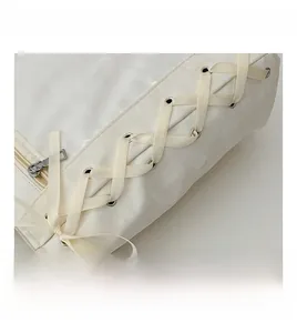 Detail shot of white ita bag showing side ribbon lacing and silver metal zippers