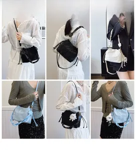 Detailed views of crossbody bucket bags in black, white, and light blue on a model