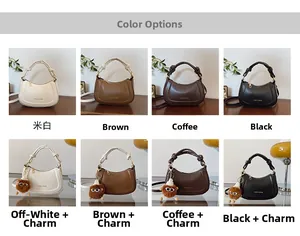 Detail view of half-moon leather bags in four colors with lion plush charm options