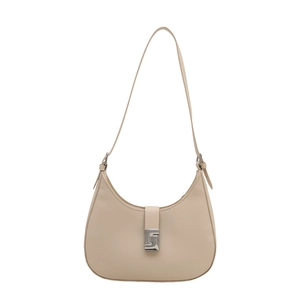 Chic beige crescent underarm bag with smooth leather finish and silver metal buckle