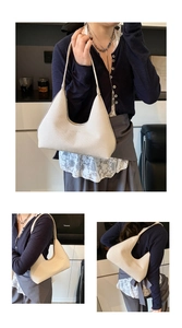 Détails du grand sac hobo crème montrant la texture tissée et la forme en demi-lune