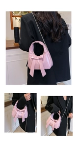 Detailed views of pink patent leather bow handbag with metallic chain strap from various angles