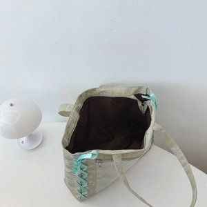 Japanese style mint green bow tote bag with ribbon details and spacious interior