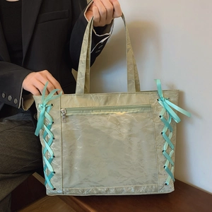 Mint green large capacity tote bag with ribbon bow details and pleated texture design