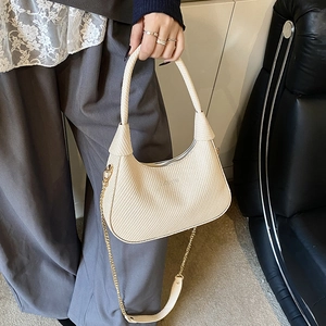 Chic beige woven texture shoulder bag with gold chain strap and elegant top handle