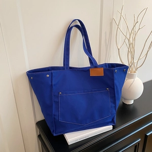 Sac fourre-tout en toile bleu marine minimaliste avec poche frontale et cuir