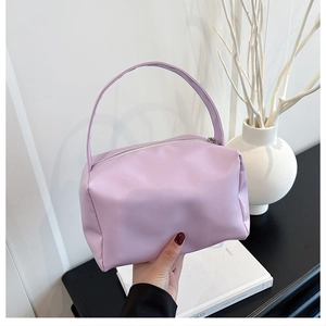 Lavender PU leather mini handbag with a top handle and smooth zipper closure