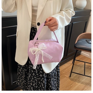 Chic lavender satin handbag with delicate lace bow and pearl detail for women