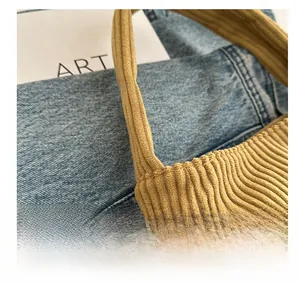 Close-up of yellow corduroy fabric texture and stitching on minimalist shoulder bag