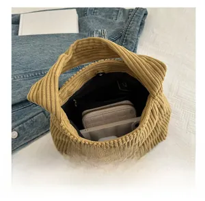 Detailed interior of the ginger corduroy tote bag showing large capacity and zipper pocket