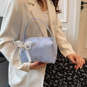 Minimalist light blue square handbag with pearl lace bow charm and single handle strap