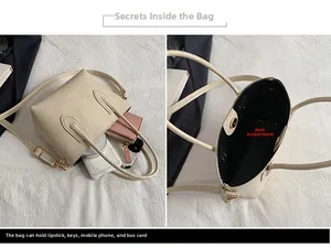 Detailed interior view of a large cream tote bag showing the main pocket capacity