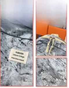 Détails du sac à dos en toile tie-dye avec surface imperméable et fermeture à glissière