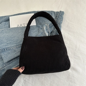 Minimalist black corduroy large shoulder bag with vintage texture for daily commute