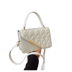 Stylish white quilted crossbody bag with gold metal trim and elegant top handle