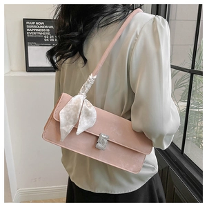 Pink matte leather underarm bag with rhinestone buckle and stylish silk scarf detail
