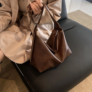Retro brown oversized PU leather hobo shoulder bag with textured finish and slouchy design