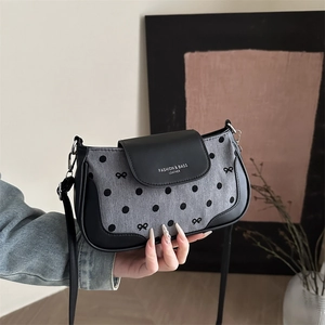 Chic dark grey canvas shoulder bag with polka dots and black leather trim for women