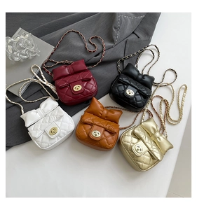 Detailed top view of quilted mini chain bags with 3D bows in five vibrant colors