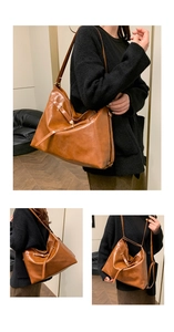 Close-up detail of vintage brown multifunctional tote bag with unique irregular folded design