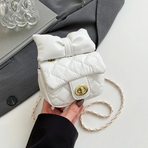 White mini crossbody bag with bow detail and gold chain strap in quilted PU leather
