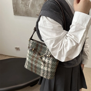 Retro plaid tweed bucket bag for women with leather straps and gold metal hardware
