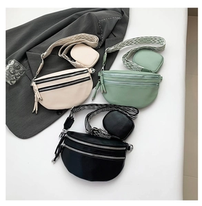 Crossbody chest bags in beige, mint green and black with geometric wide straps