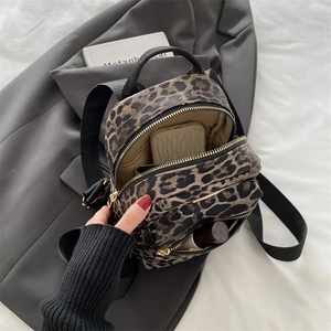 Fashion leopard print mini backpack for women with golden zippers and compact multi-pockets