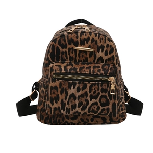 Fashionable leopard print backpack with gold zippers and black adjustable straps