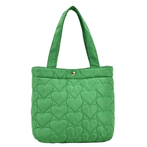 Minimalist green heart quilted tote bag with gold snap closure and dual handles