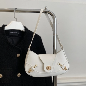 Elegant white patent leather crescent shoulder bag with gold studs and metallic buckle