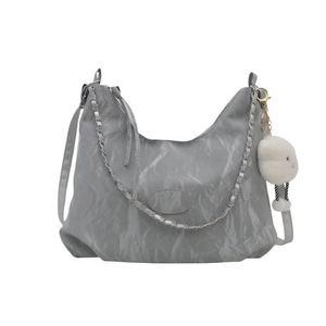 Chic grey pleated shoulder bag with silver chain strap and plush cloud charm