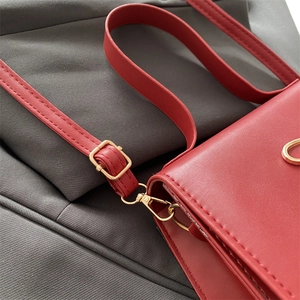 Red bow fashion small square bag with golden hardware and adjustable shoulder strap