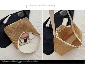 Detail view of woven straw tote bag featuring magnetic closure and white leather straps