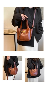 Detailed views of vintage brown leather handbag with metal logo and woven charm