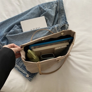 Large beige corduroy tote bag for women showing spacious interior and metal chain strap