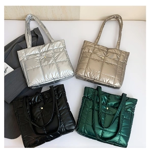 Detailed grid of four quilted down tote bags in metallic silver gold black and green