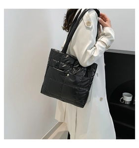 Quilted down shoulder bag with glossy finish and metal buckle detail on exterior pocket