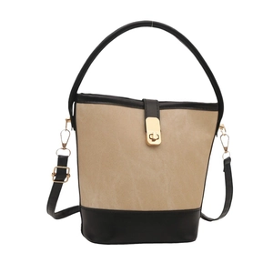 Retro contrast bucket bag in beige canvas and black leather with gold metal lock