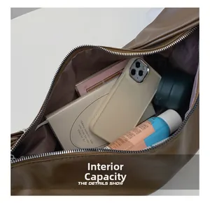 Interior view of spacious dark brown PU leather tote bag showing large storage capacity