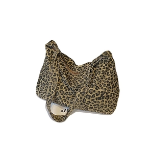 Large leopard print canvas tote bag with dual straps and secure zipper closure for women