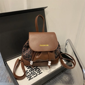Chic leopard print mini backpack for women with leather trim and fashion lettering