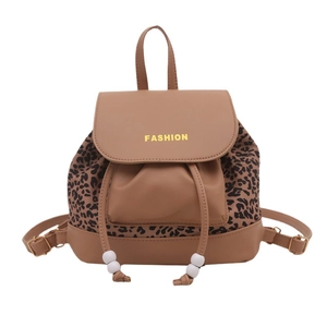 Fashion women's large camel faux leather backpack with leopard print details and top handle